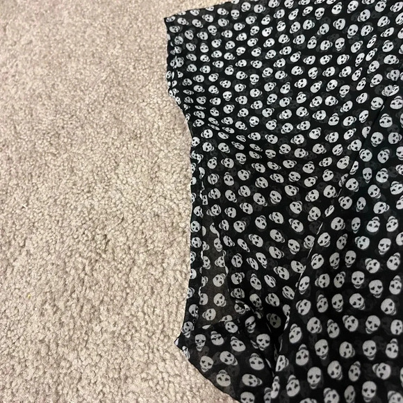 Torrid Georgette Ruffle Front Flutter Sleeve Blouse with Skulls - Picture 9 of 9